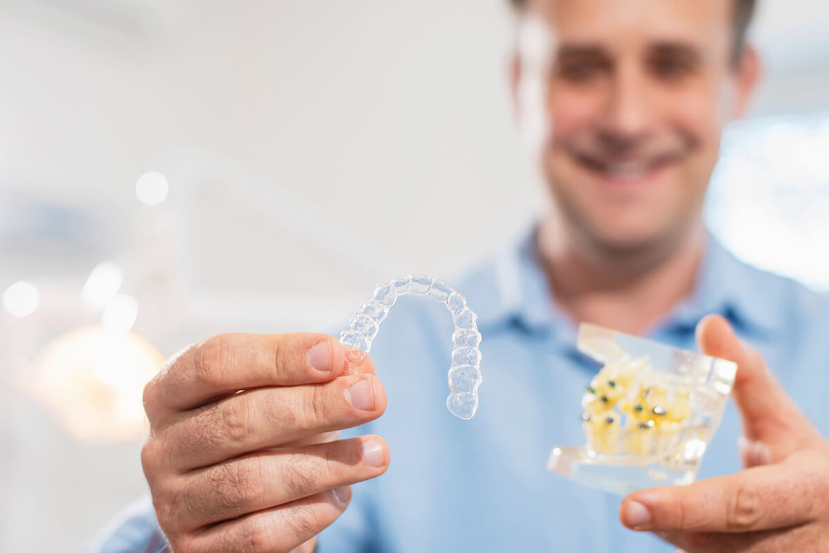 Can You Eat With Invisalign? Smiles on the Upper Westside