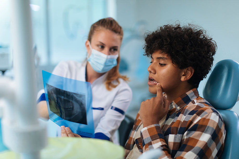 Doctor Showing x-ray to patient