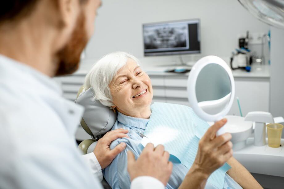 elderly woman at dentist office