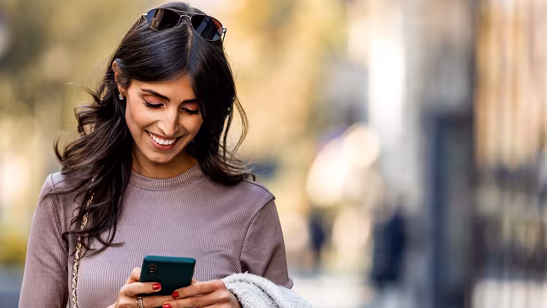 Woman walking on phone